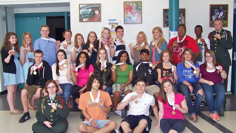 Gold medal winners shown in photo (back row, l-r) Leah Toomey, Ashleigh Sturgis and Scott Bell, Community Service; Brooke Givens, Lindsi Ware, Anne Hammond, Emily Dell and Richard Gallo, Chapter Business; Julia Woosley and Brittany Chesser, Crime Scene Investigation; Kaishee Hopkins and Myles Gray, Robotics; and Aidan Gause, Job Demo; middle row - Joey Powers, Principles of Technology; Emily Tull, Basic Health Care; Charinel Matos, Kaitlyn Adkins, Te'Myra Brown, Amit Vyas, Melanie Moore, Courtney Taylor and Kristina Metz, OCC Team; front row - Tara Windels, Tech Comp. Applications; Ben Dispoto, TV Production (missing is Taylor Thornberg); Stephen Mervine and Rebecca Southmayd, Broadcast News (missing are Katie Breitzel and Sara Samaha).